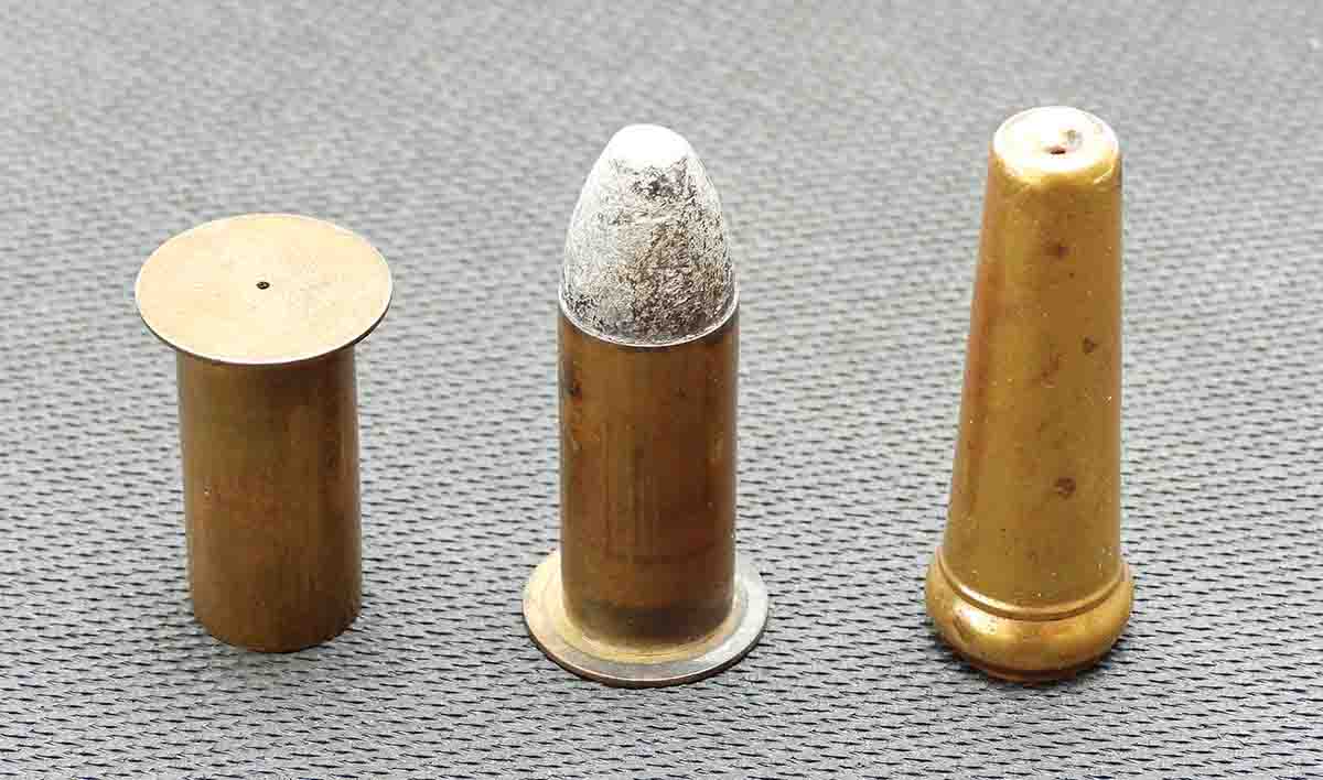 An empty Maynard cartridge (left), loaded Maynard (center), and a Burnside hull (right). Both types had a tiny hole in the base for the flame from the separate musket cap to reach the powder. The brass could also be reloaded many times in the field with no complicated tools. With the Maynard for example, the Confederates even issued a paper cartridge reload that fit right inside the empty brass hull.